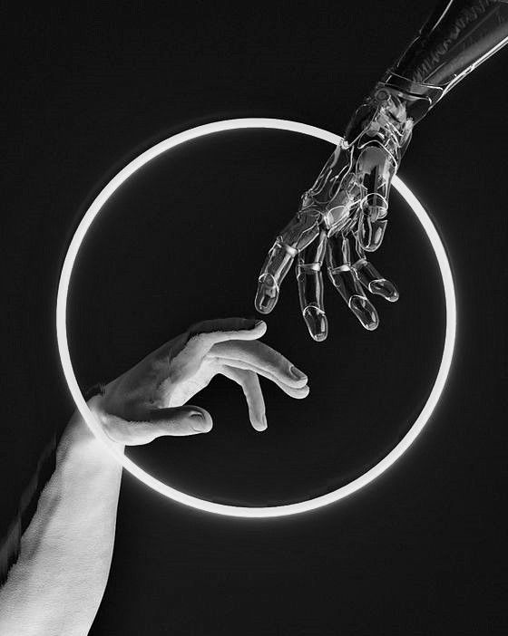 Human hand reaching toward a robotic hand through a glowing ring
